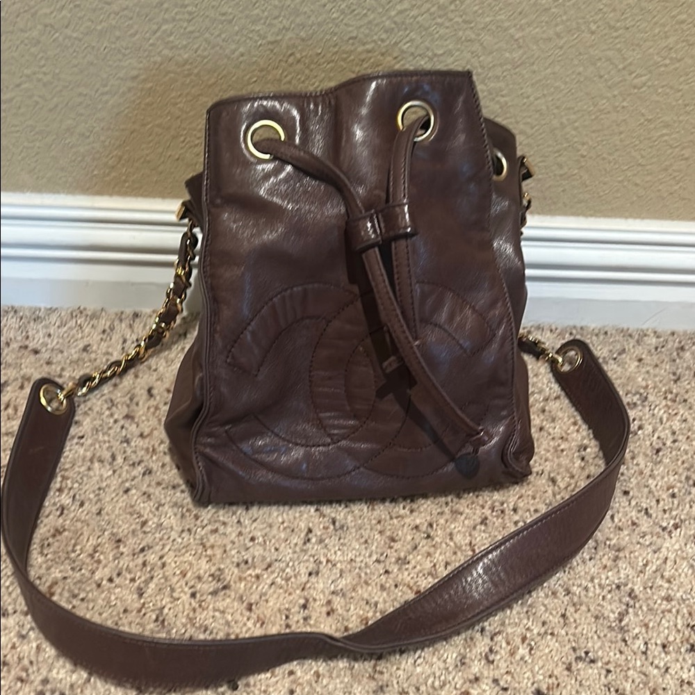 CHANEL Brown and Gold Crossbody Bag with Elegant Design